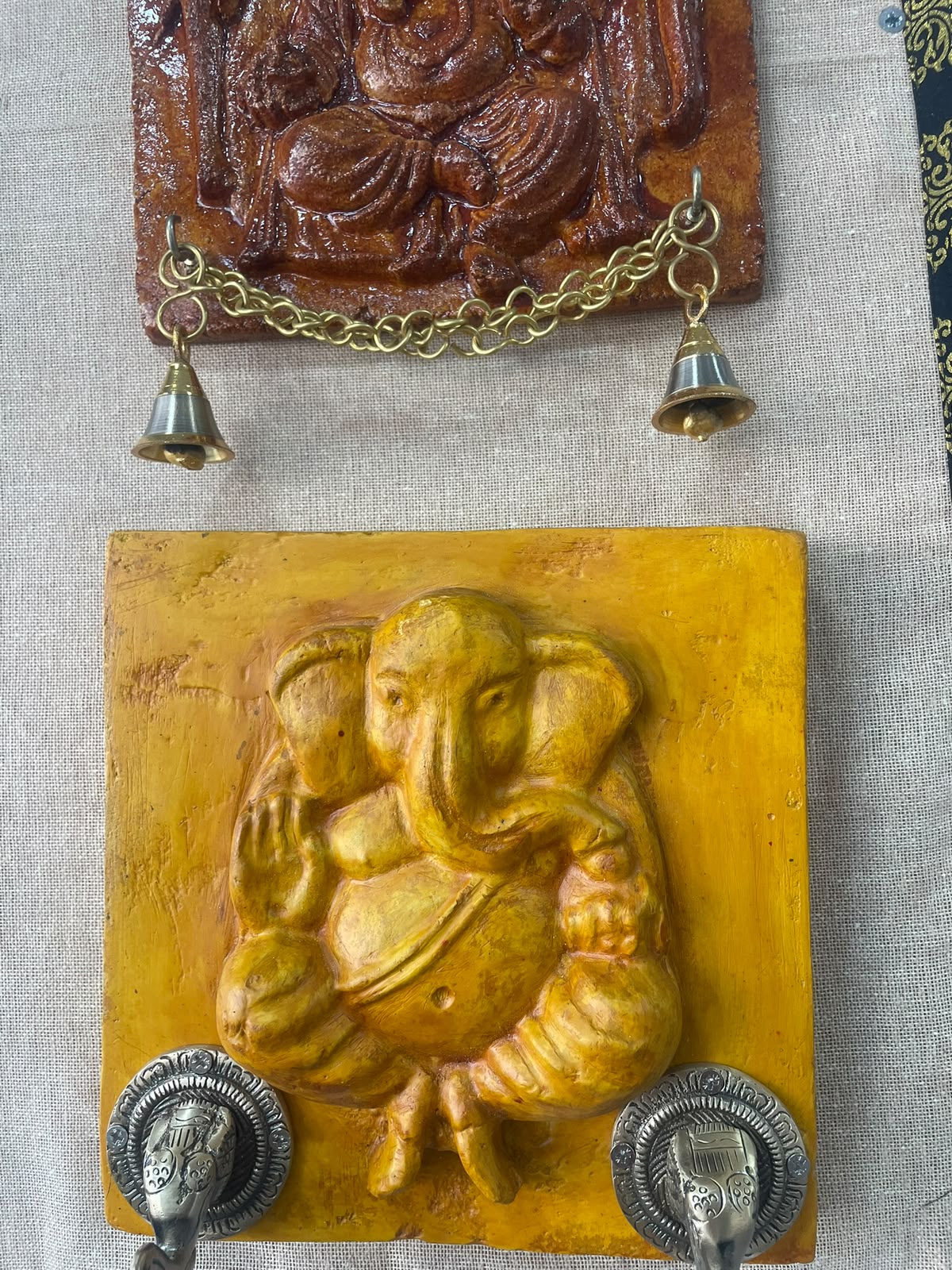 Mannoli yellow Ganesha relief with decorative metal elephant details